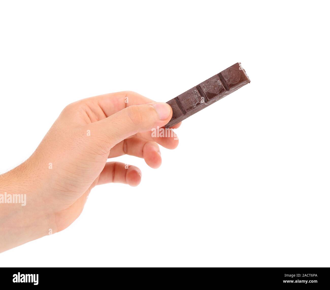 Hand holds chocolate bar. Stock Photo