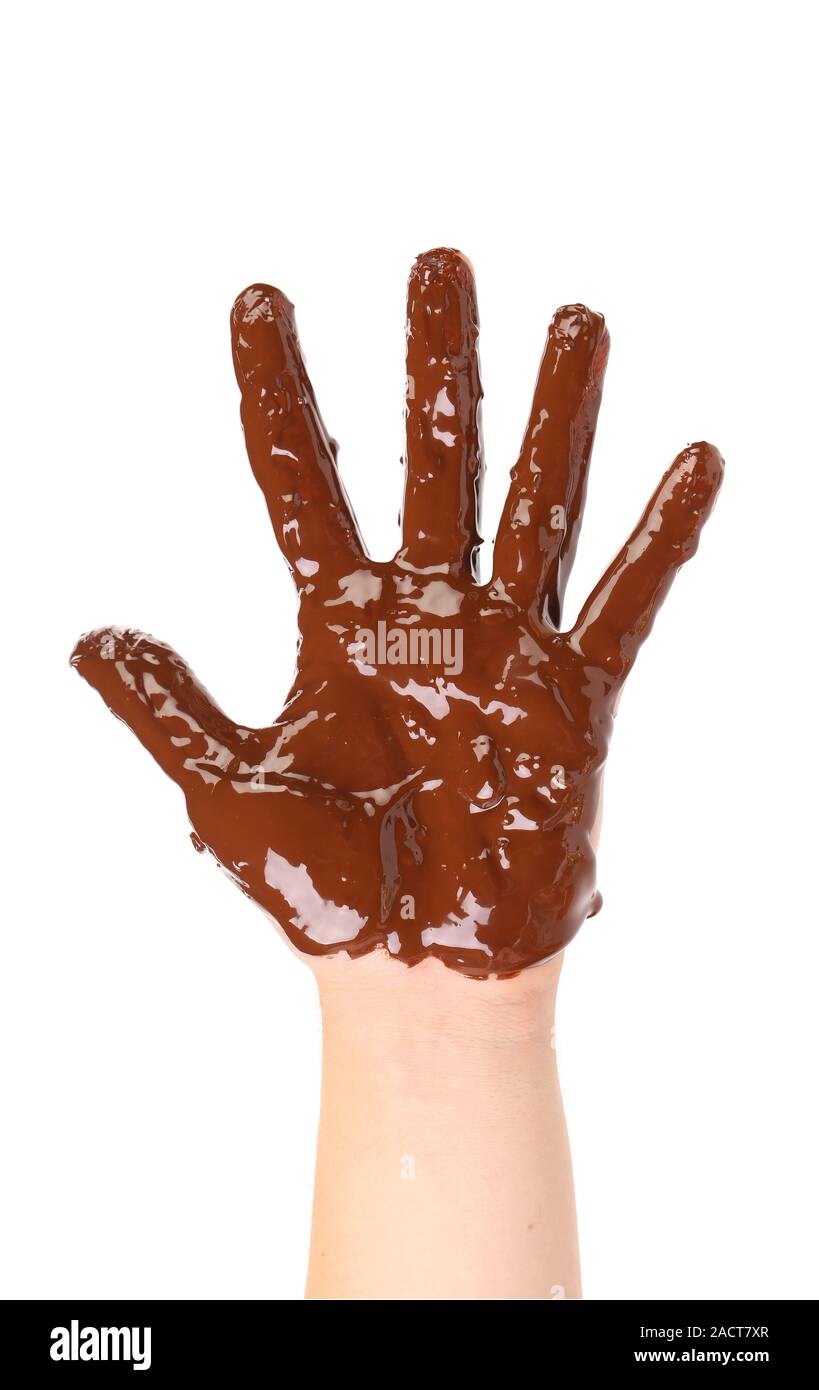Children's hand stained with chocolate frosting Stock Photo Alamy
