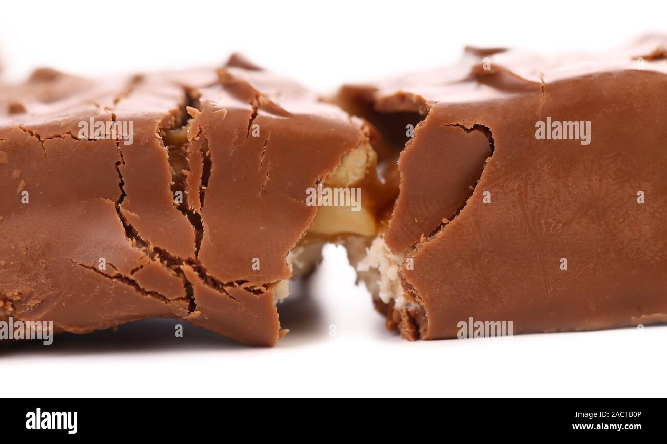 Broken chocolate bar with filling Stock Photo - Alamy