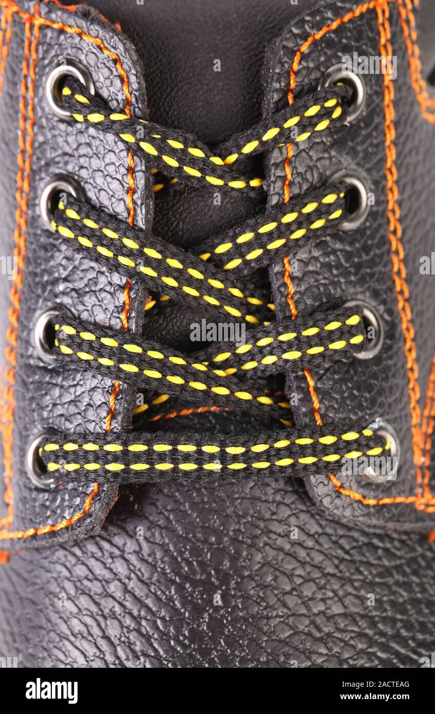Black leather shoe laces in close-up Stock Photo - Alamy