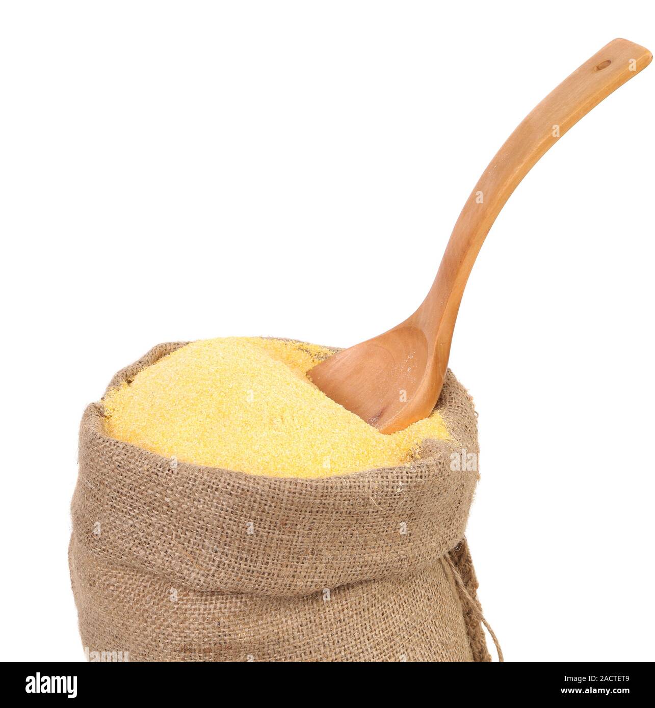bag of ground corn and a wooden spoon Stock Photo