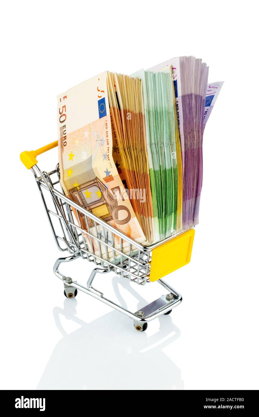 Banknotes in a shopping cart Stock Photo