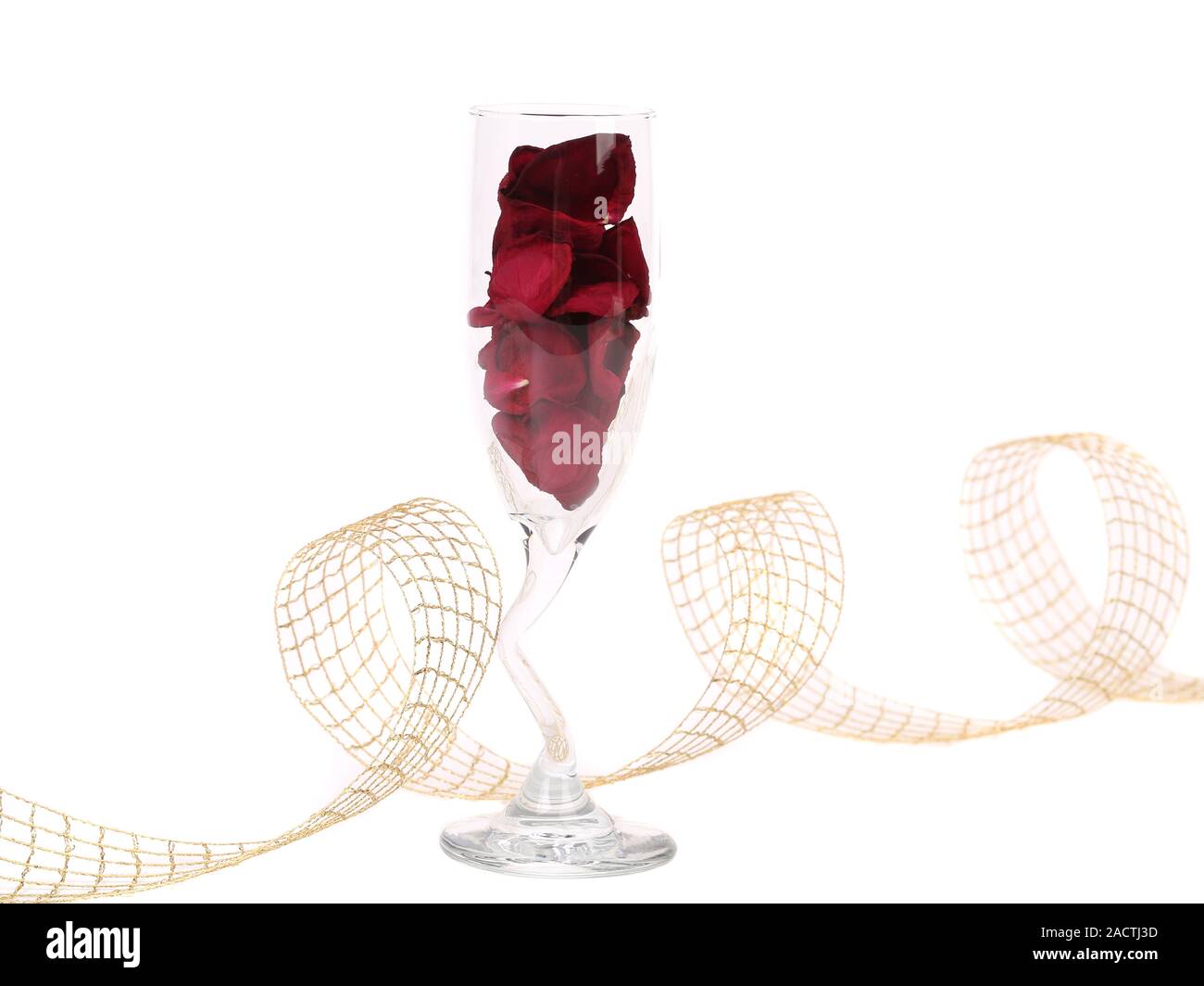 Glass with rose petals and ribbon Stock Photo Alamy