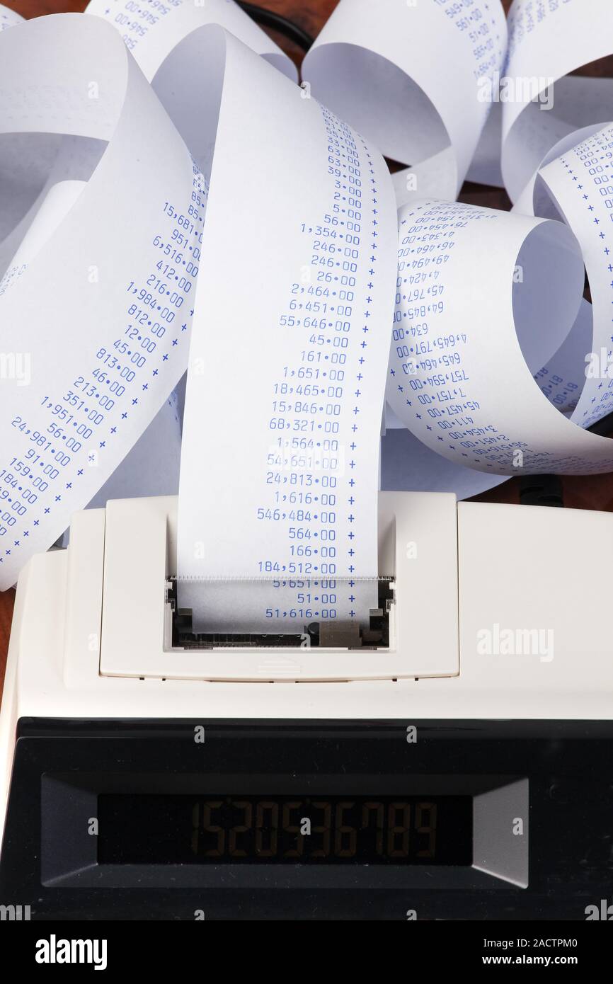 Desktop calculator with arithmetic strips for costs, output Stock Photo