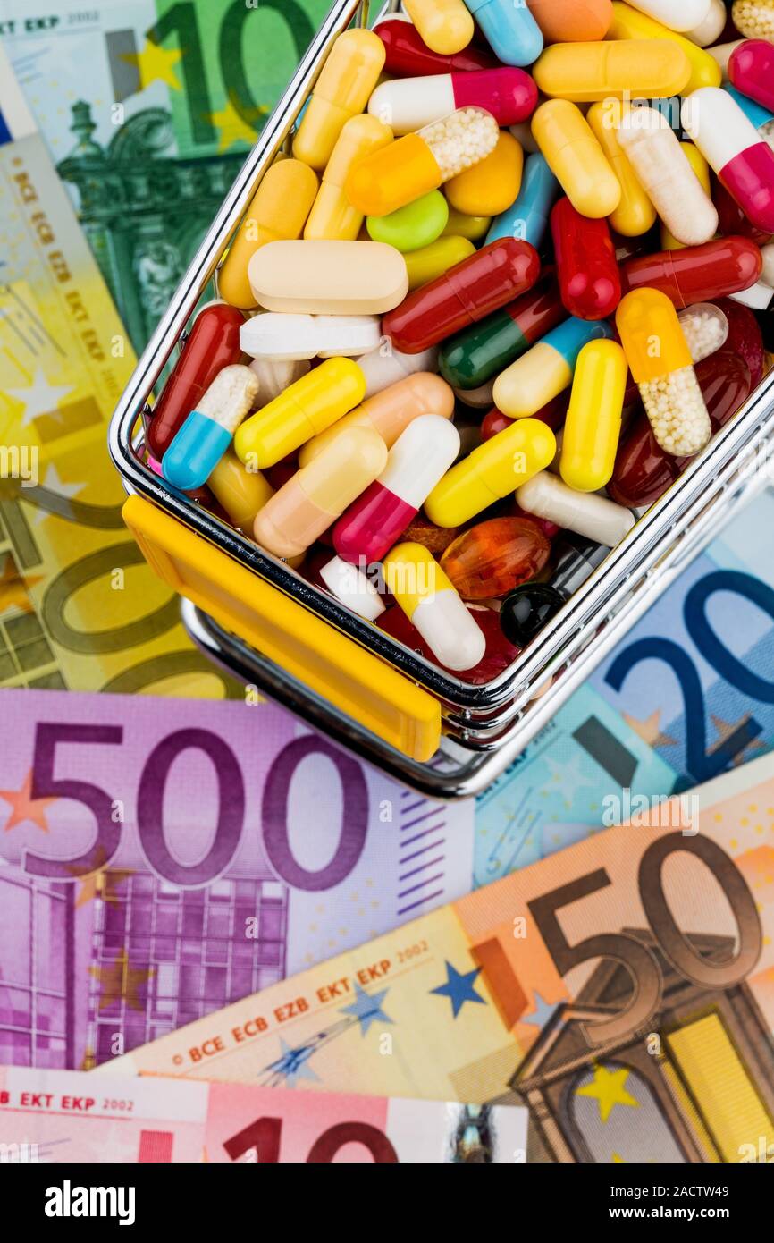 Tablets, Shopping Cart, Euro Notes Stock Photo