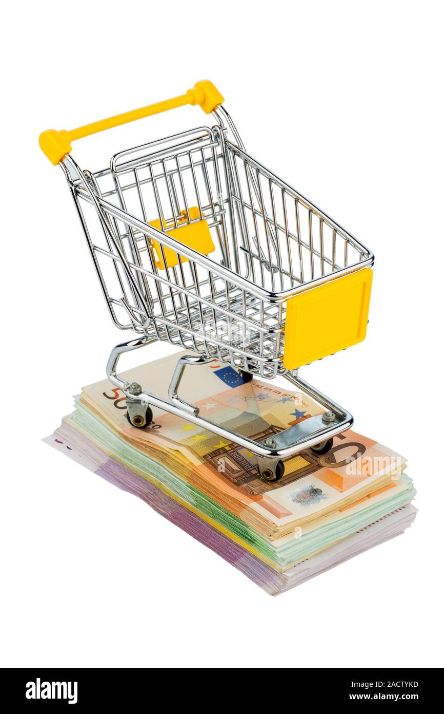 Shopping cart on banknotes Stock Photo