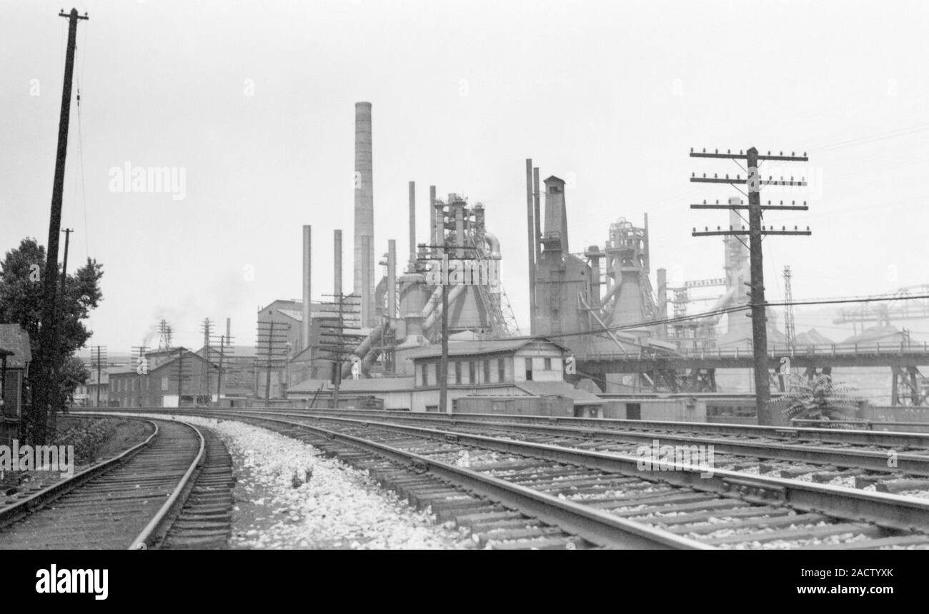 Iron works. These buildings, blast furnaces and railway are part of the