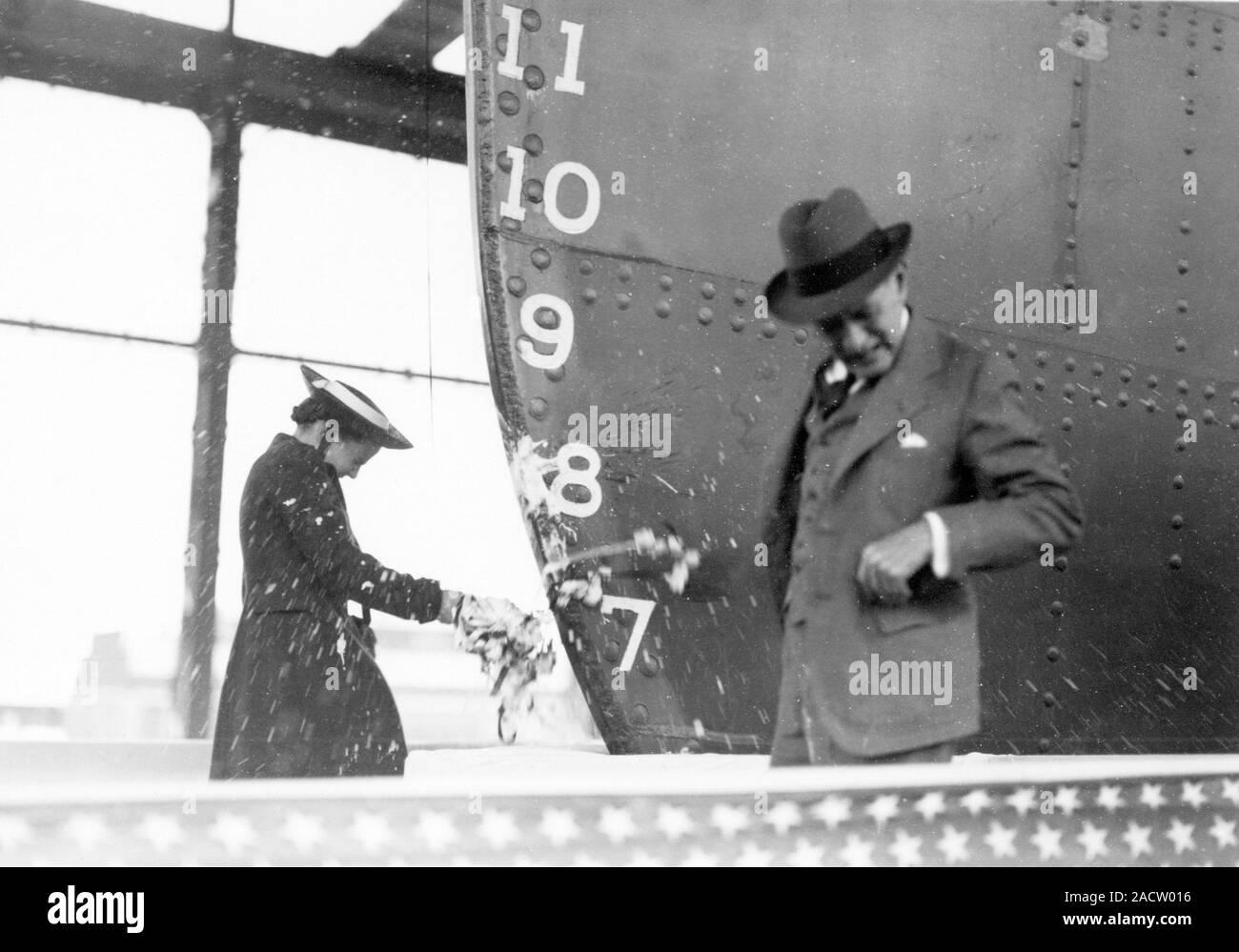 Cavalier cargo ship christening. Bottle being smashed in 1938 on the