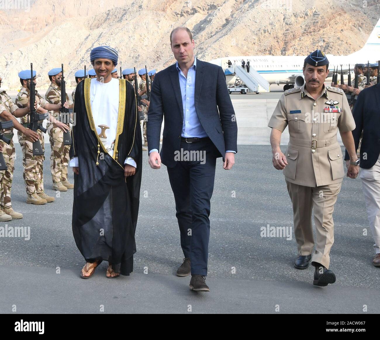 The Duke of Cambridge (centre) arrives at Khasab Airport, Oman, as part of his tour of Kuwait and Oman. Stock Photo