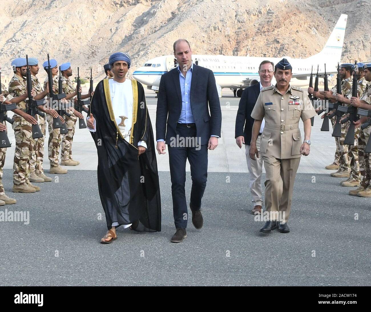 The Duke of Cambridge (centre) arrives at Khasab Airport, Oman, as part of his tour of Kuwait and Oman. PA Photo. Picture date: Tuesday December 3, 2019. See PA story ROYAL Tour. Photo credit should read: Tim Rooke/PA Wire Stock Photo