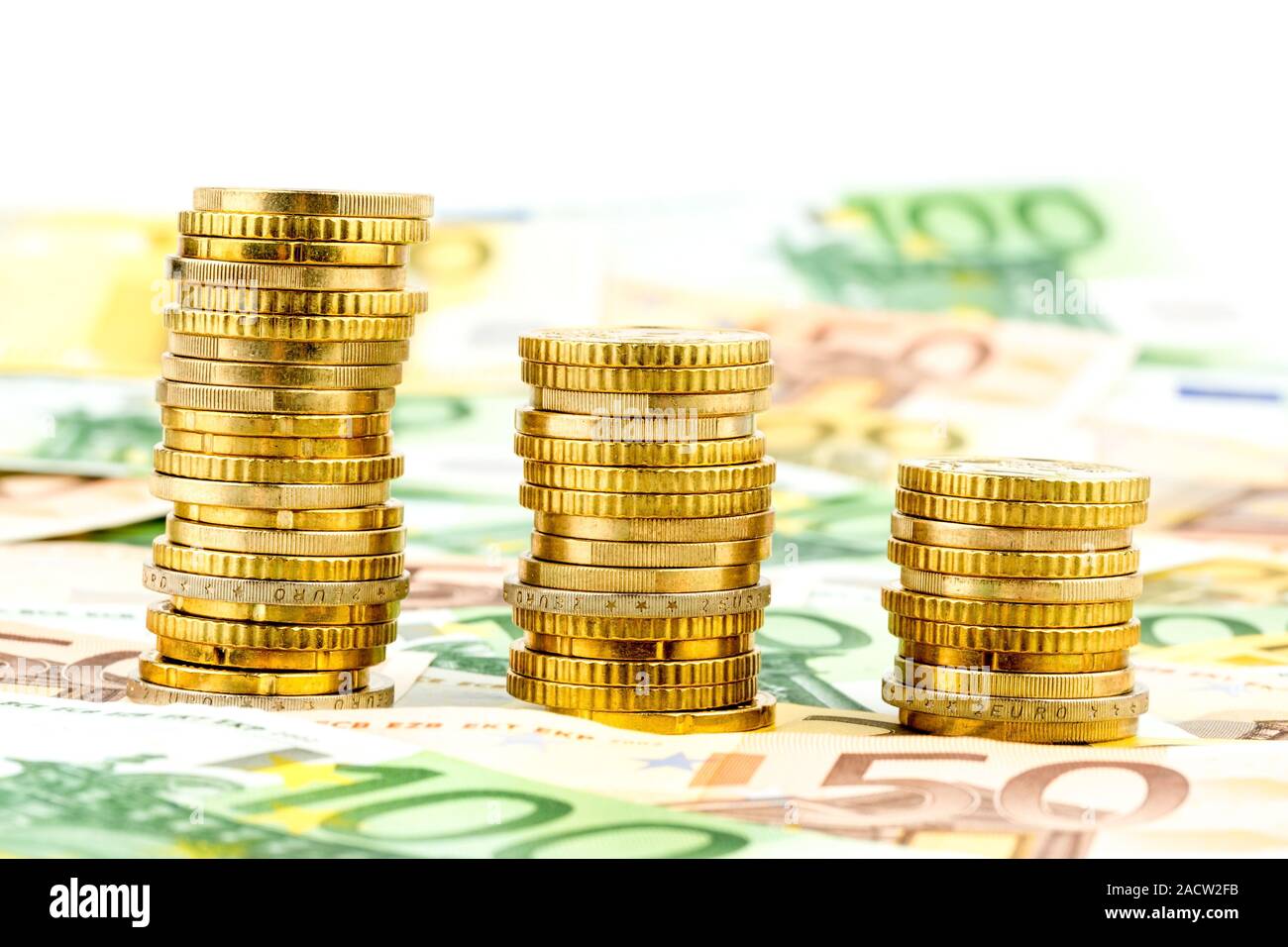Stack of money coins, sinking curve Stock Photo Alamy