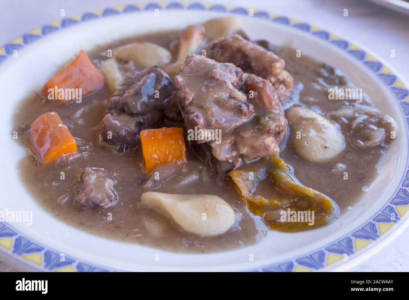 Oxtail with side dishes Stock Photo Alamy