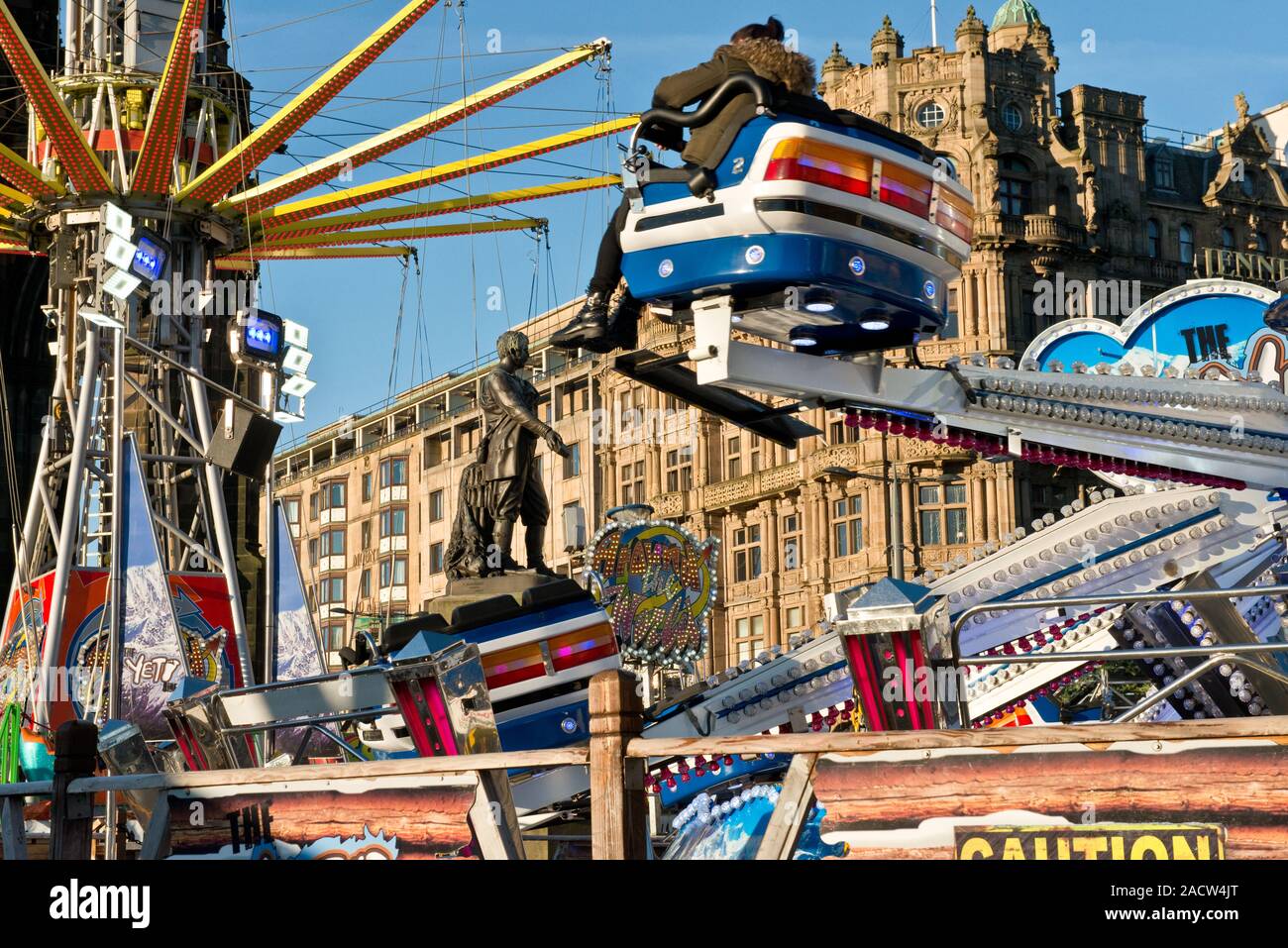 Yeti and Star Flyer fairground rides. Edinburgh Christmas Market and