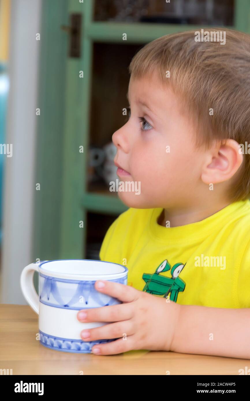 Child with cup Stock Photo Alamy