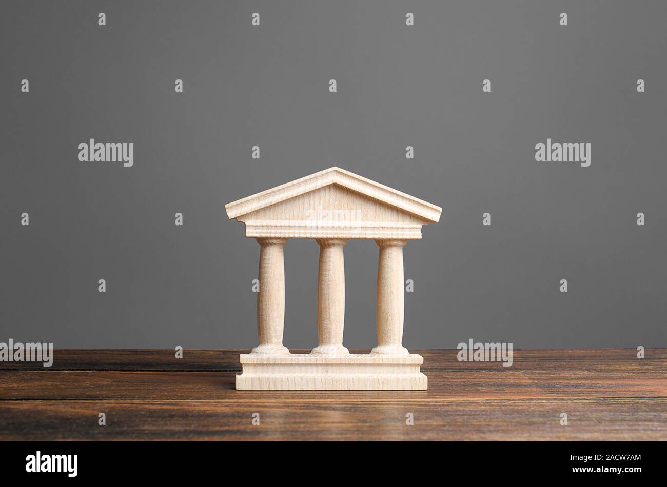 Building figurine with pillars in antique style. Concept of city