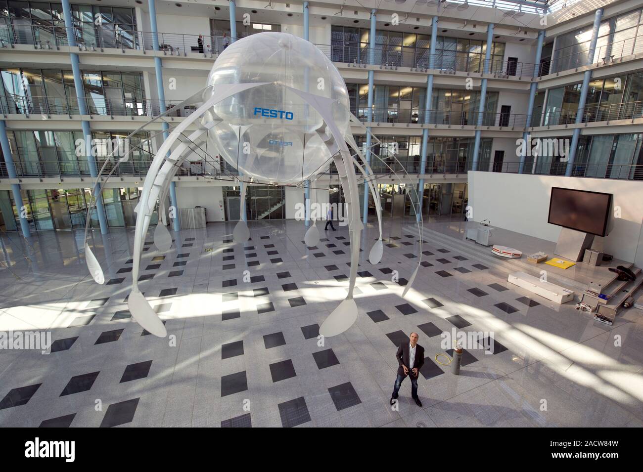 FESTO AirJelly. Man controlling a remote controlled AirJelly in an