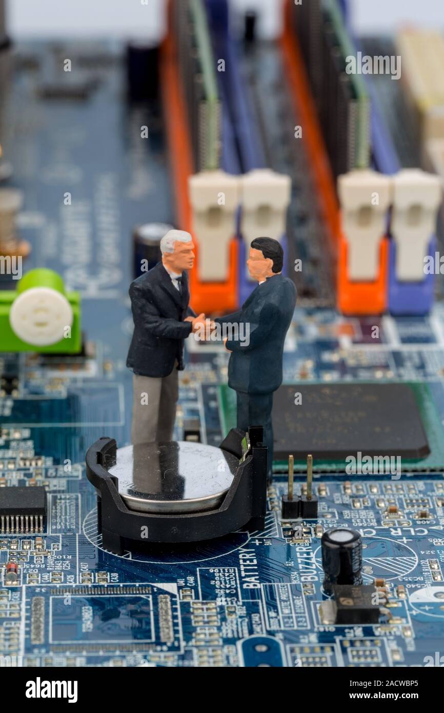 Two managers on computer board Stock Photo