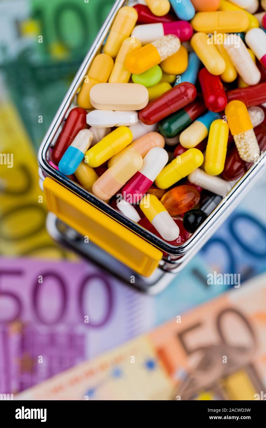 Tablets, Shopping Cart, Euro Notes Stock Photo