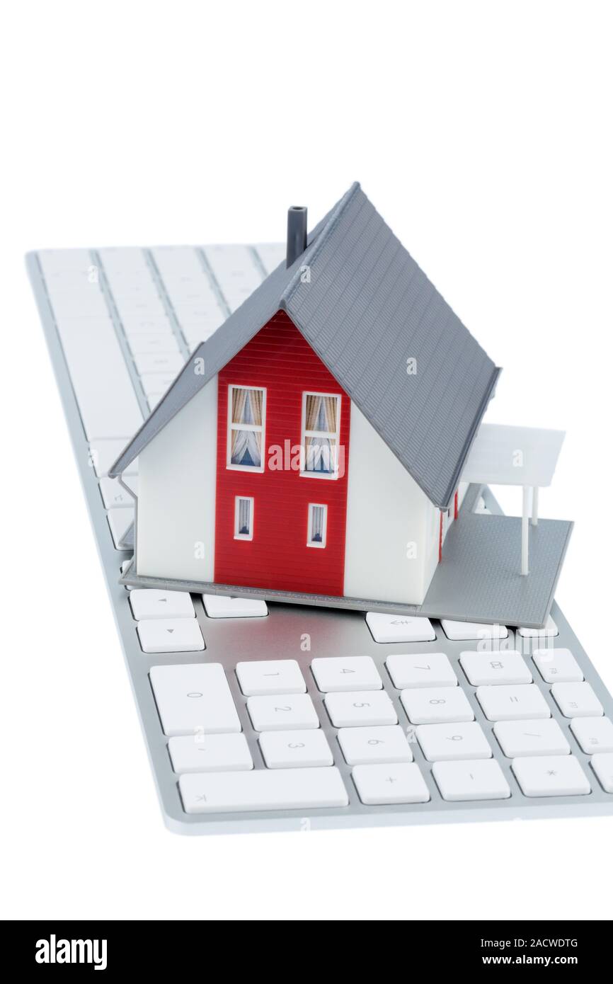 House on keyboard Stock Photo Alamy