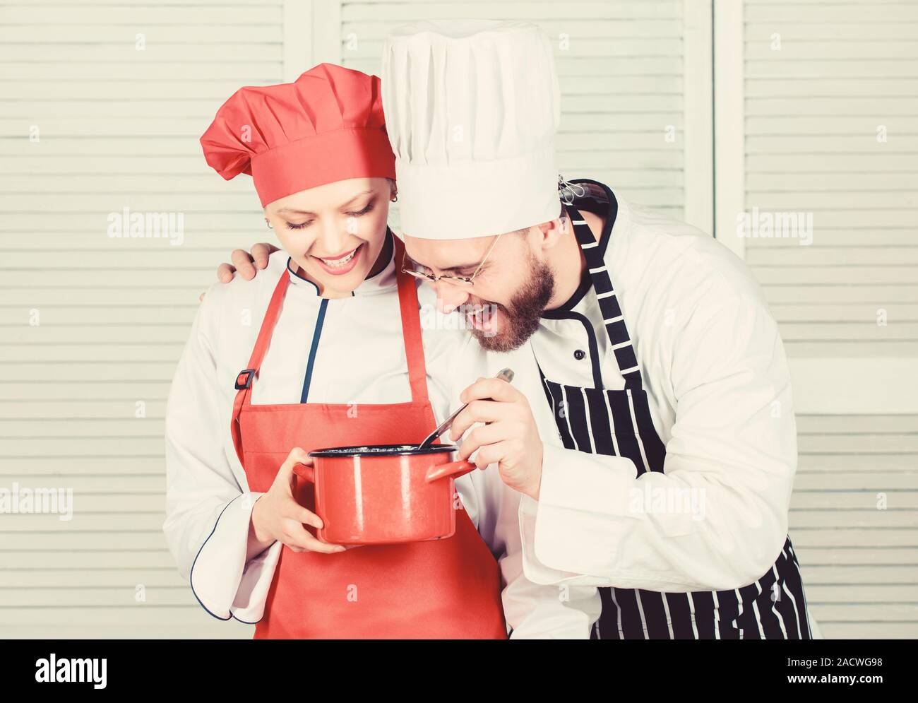 Need some help. Family cooking in kitchen. couple in love with perfect ...