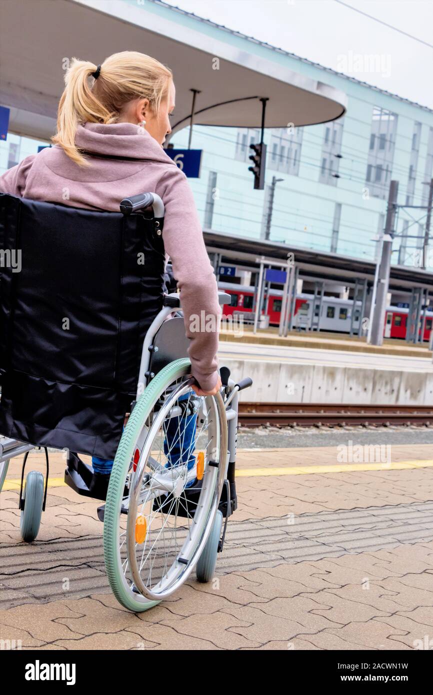 Woman in wheelchair train hi-res stock photography and images - Alamy