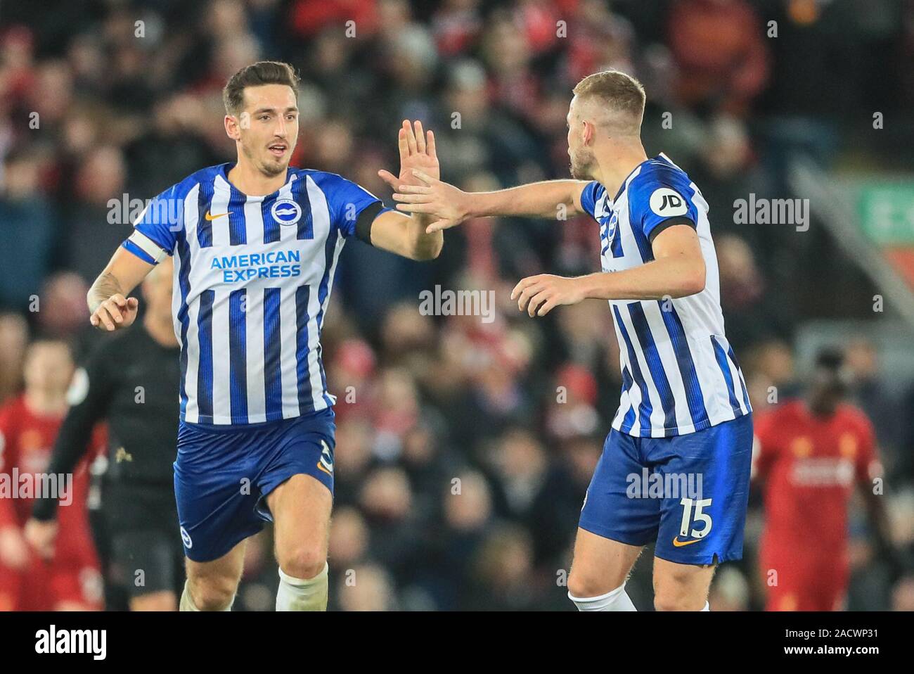 30th November 2019, Anfield, Liverpool, England; Premier League, Liverpool v Brighton and Hove Albion : Lewis Dunk (5) of Brighton celebrates his goal to make it 2-1 Credit: Mark Cosgrove/News Images Stock Photo