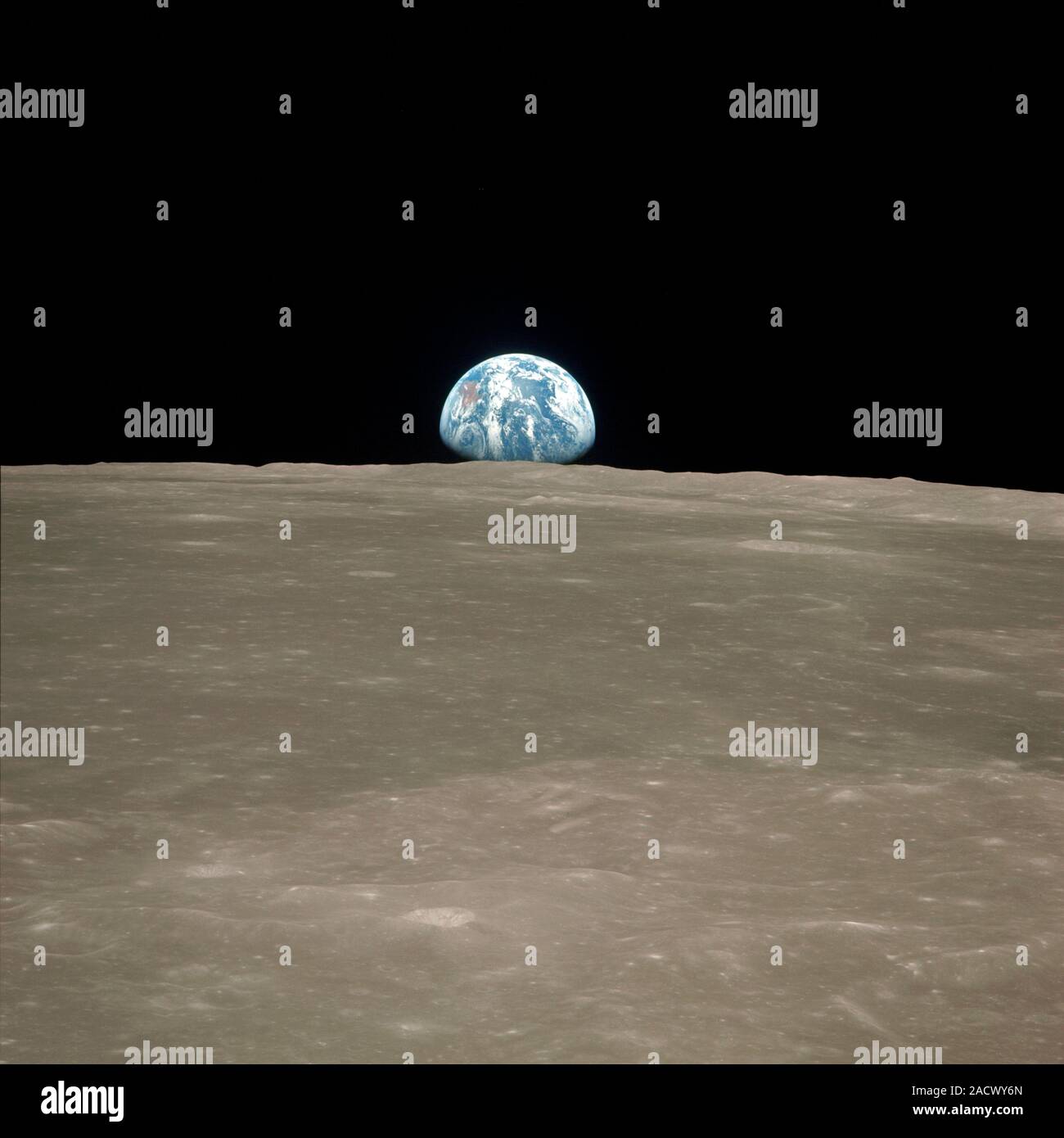 Earthrise over the Moon taken by the Apollo 11 crew from the spacecraft ...