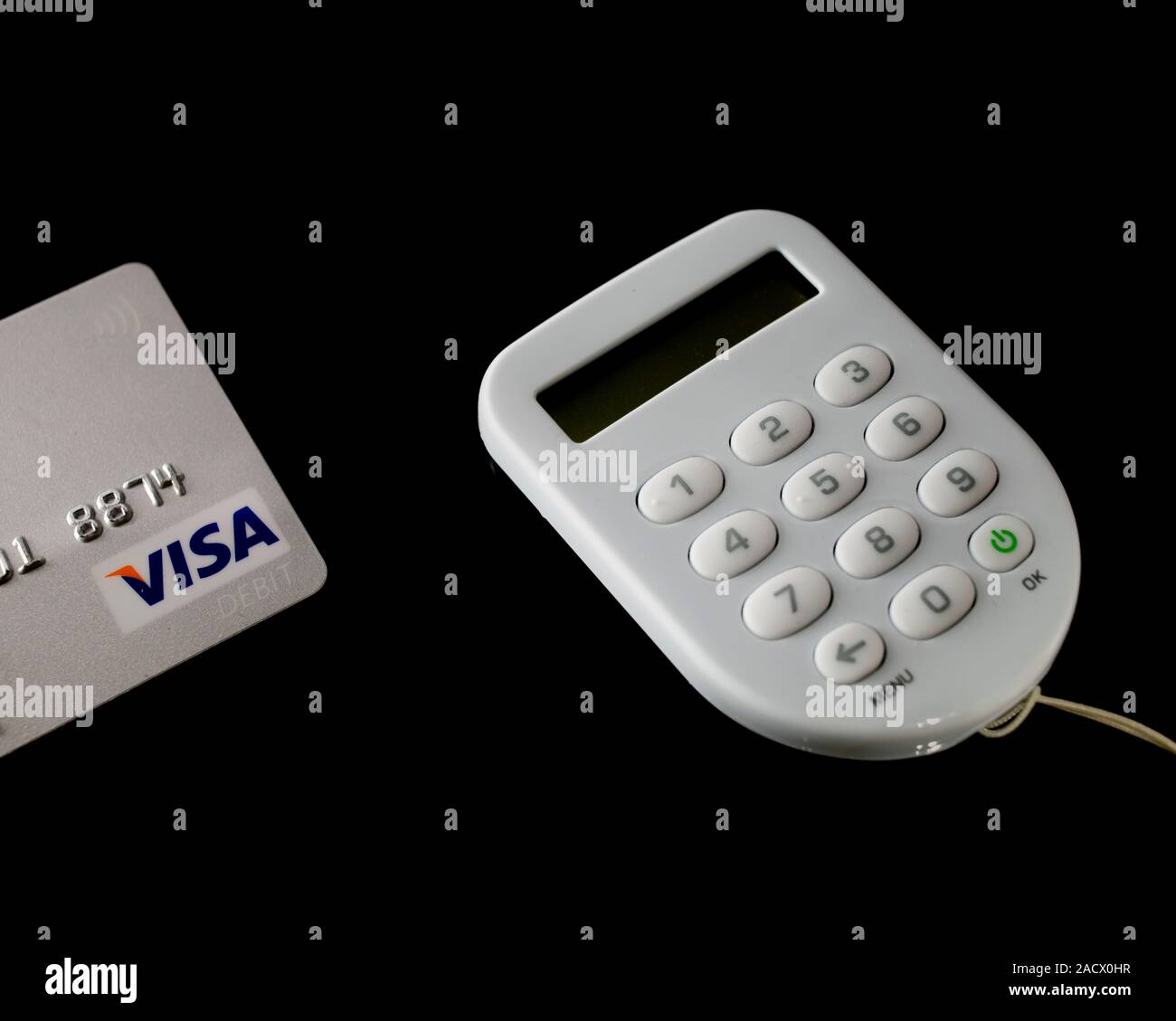 Bank security token and debit card Stock Photo - Alamy