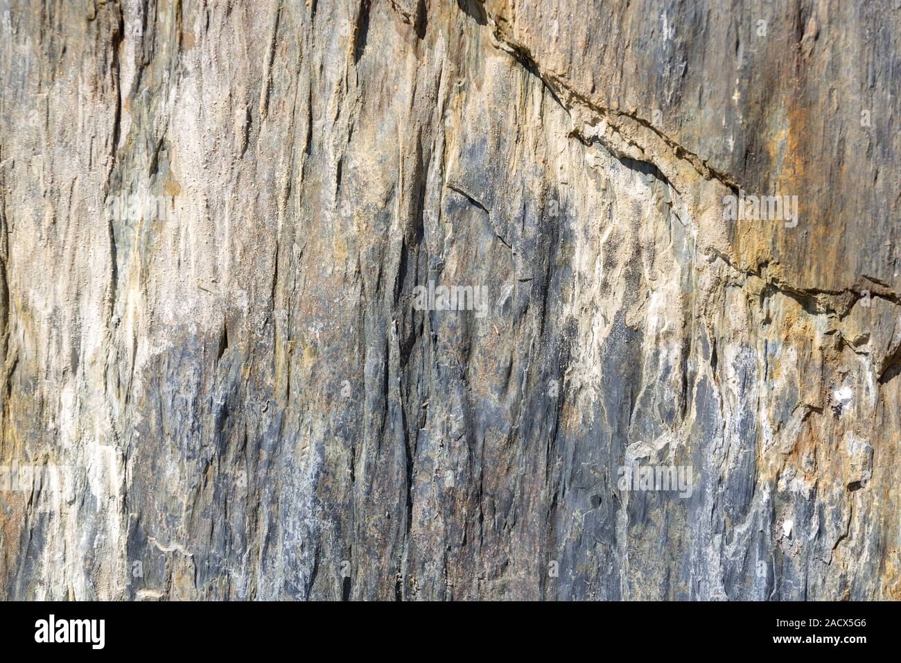 Stone or rock wall as background Stock Photo - Alamy