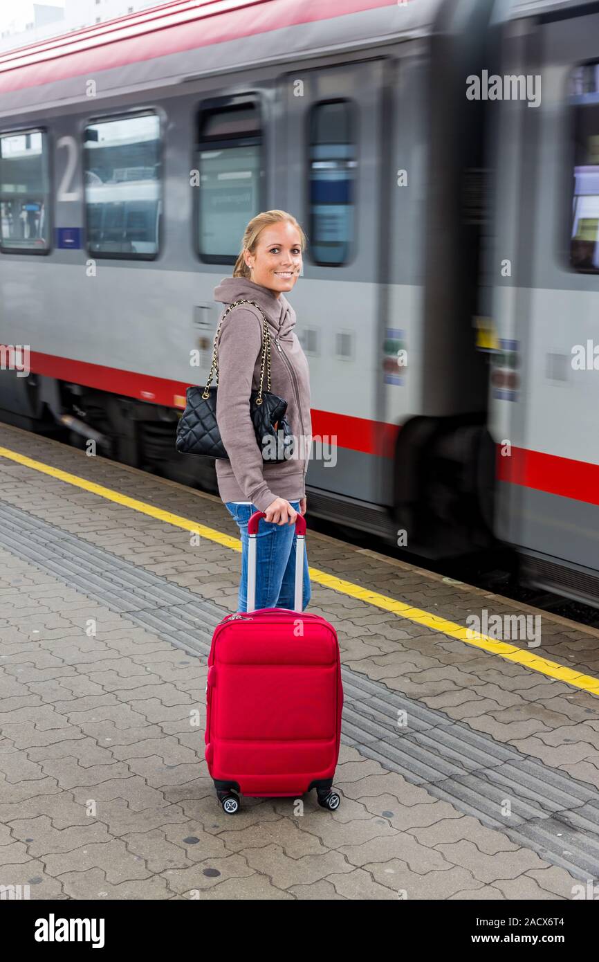 Woman waiting train hi-res stock photography and images - Alamy