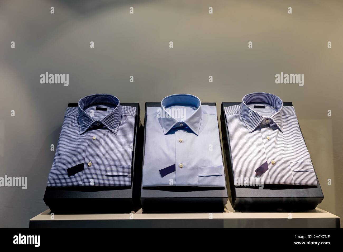 Three men's shirts next to each other Stock Photo Alamy