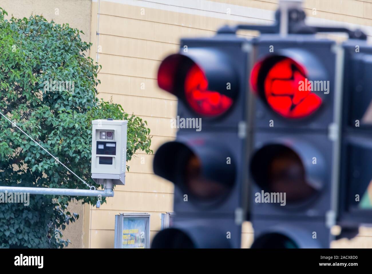 Traffic light with red light camera Stock Photo