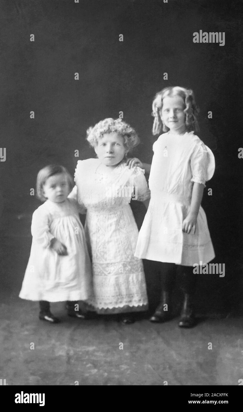 Mother with dwarfism with daughters, photographed as part of research