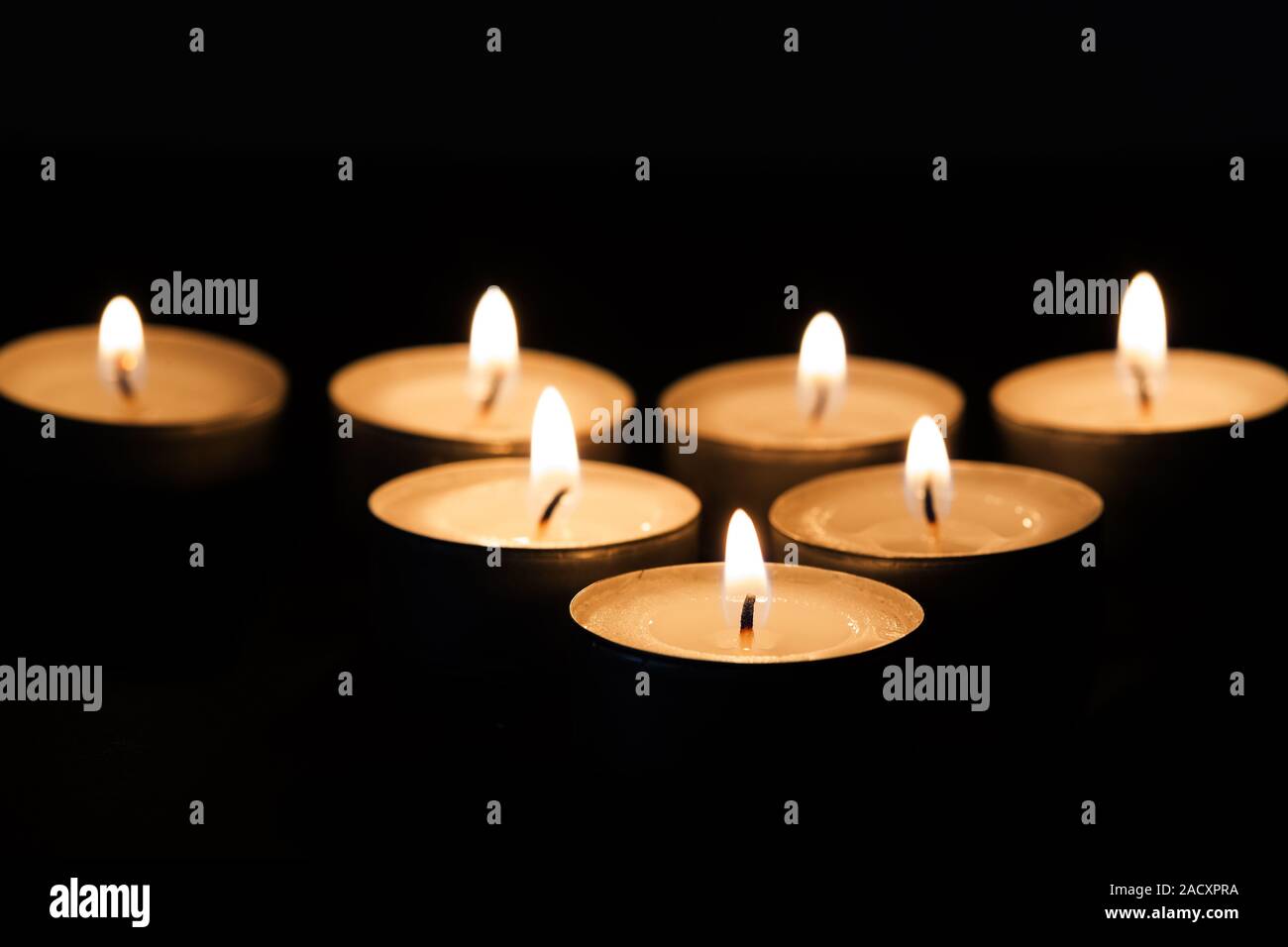 Burning tea lights Stock Photo Alamy