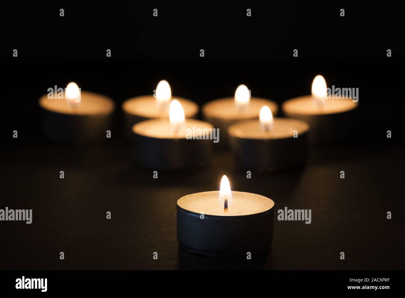 Burning tea lights Stock Photo Alamy