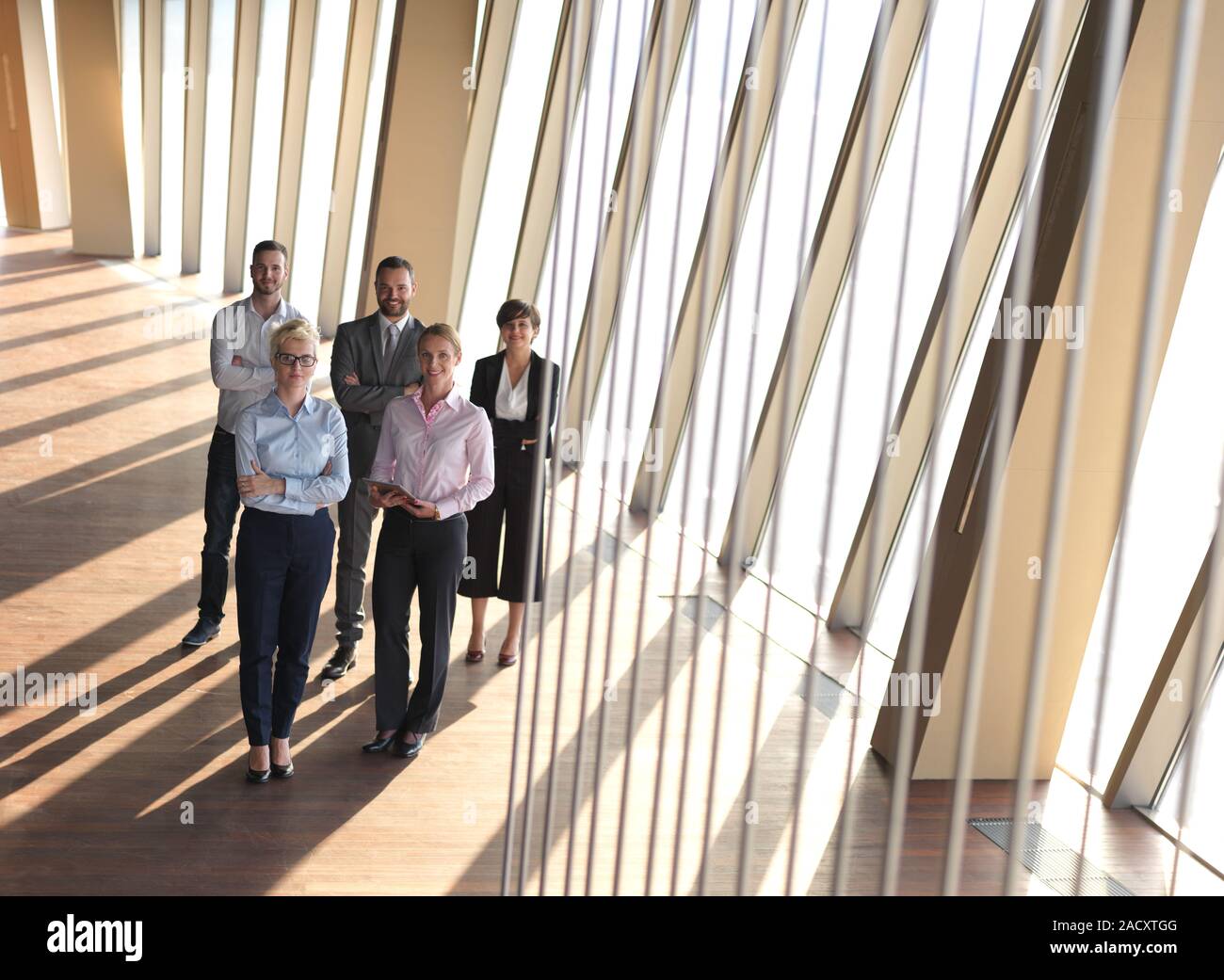 Business people group standing together Stock Photo - Alamy