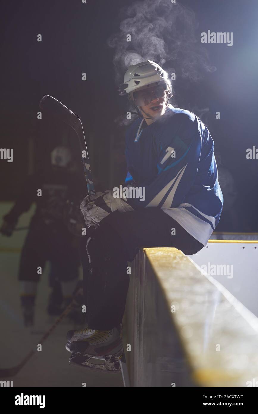 ice hockey players on bench Stock Photo Alamy