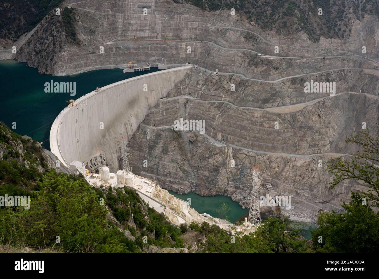 Coruh River dam construction, Turkey. View of a dam being built across the Coruh River valley (Coruh Nehri), Mescit Mountains, Turkey. A total of 15 l Stock Photo