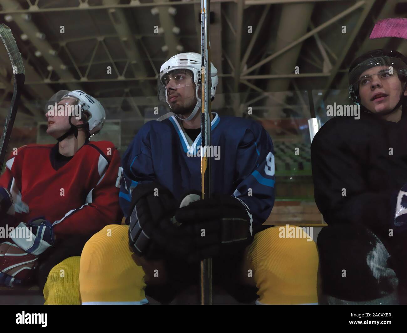 hockey players on bench Stock Photo Alamy