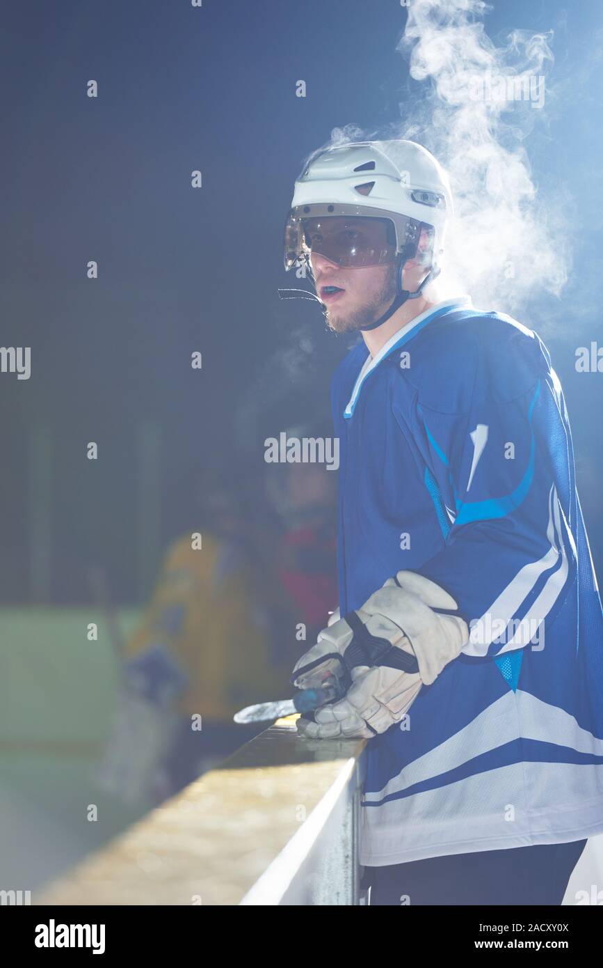 ice hockey players on bench Stock Photo Alamy