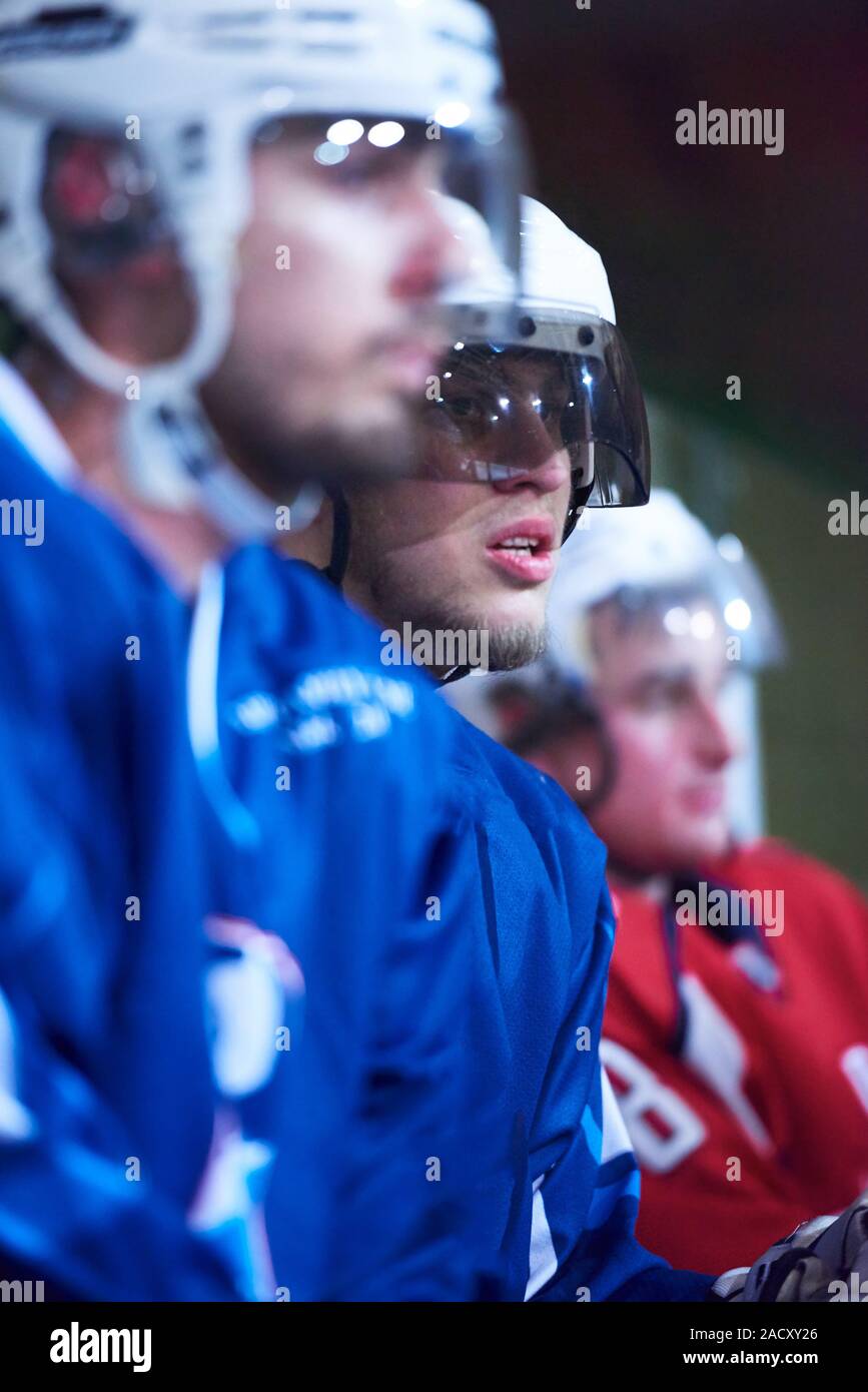 ice hockey players on bench Stock Photo Alamy