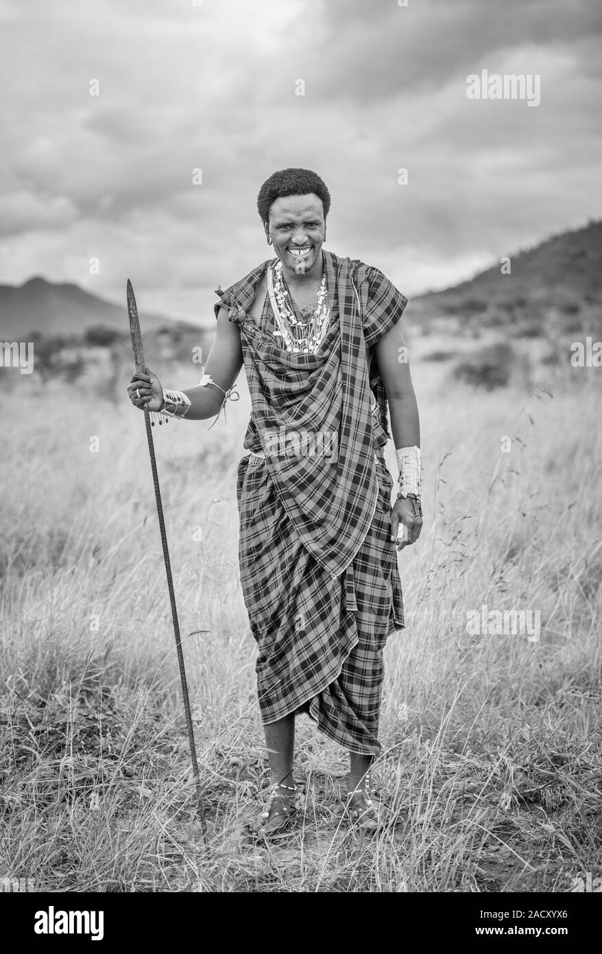 young and handsome maasai warrior in traditional clothing Stock Photo