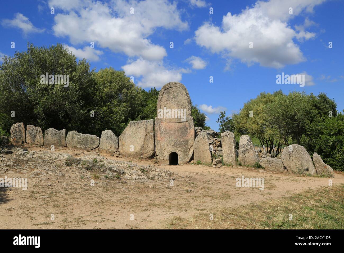 Grave mound in Sardinia near Coddu Vecchiu, the Tomba di Giganti. Stock Photo