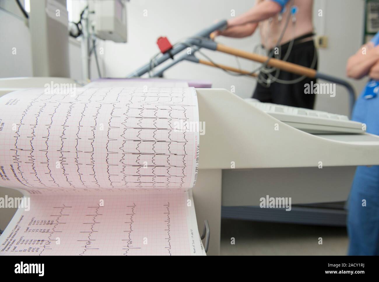 Exercise ECG. A man undergoing exercise testing on a treadmill, whilst