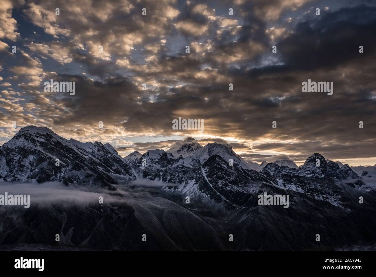 Summits of Mt. Everest and Mt. Makalu, seen from summit of Gokyo Ri, before sunrise Stock Photo