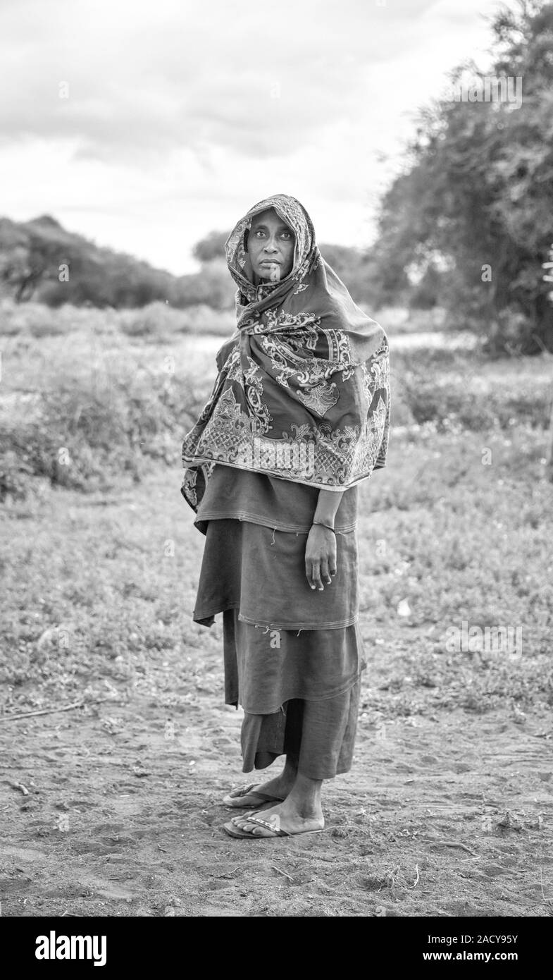 beautiful maasai woman in a savannah Stock Photo