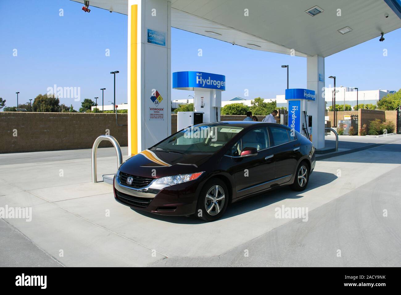 Hydrogen fuelling station. Hydrogenpowered vehicle filling up at the first US fuel station with