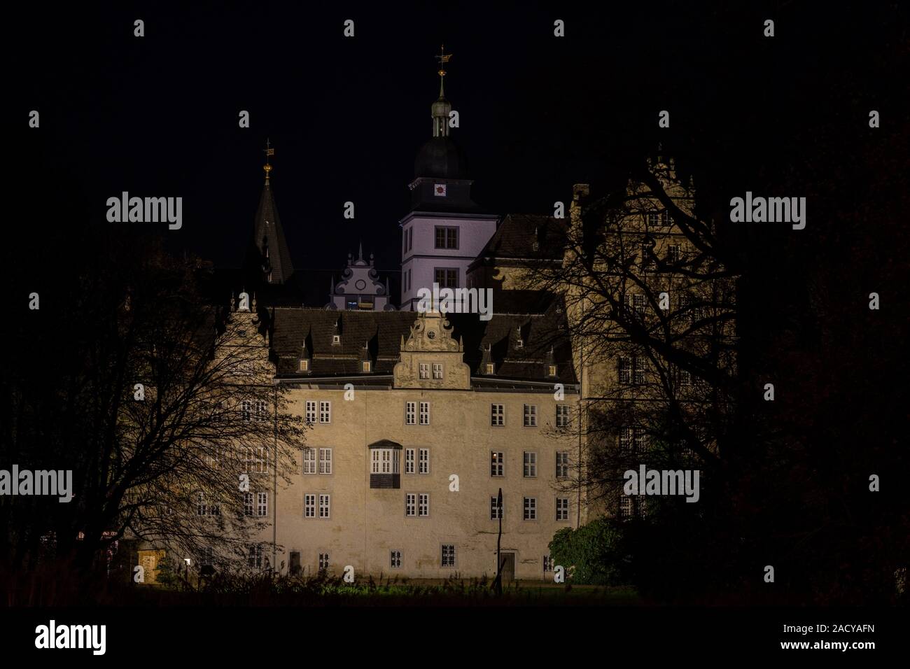 Wolfsburg castle illuminated in december evening night in Lower Saxony Stock Photo