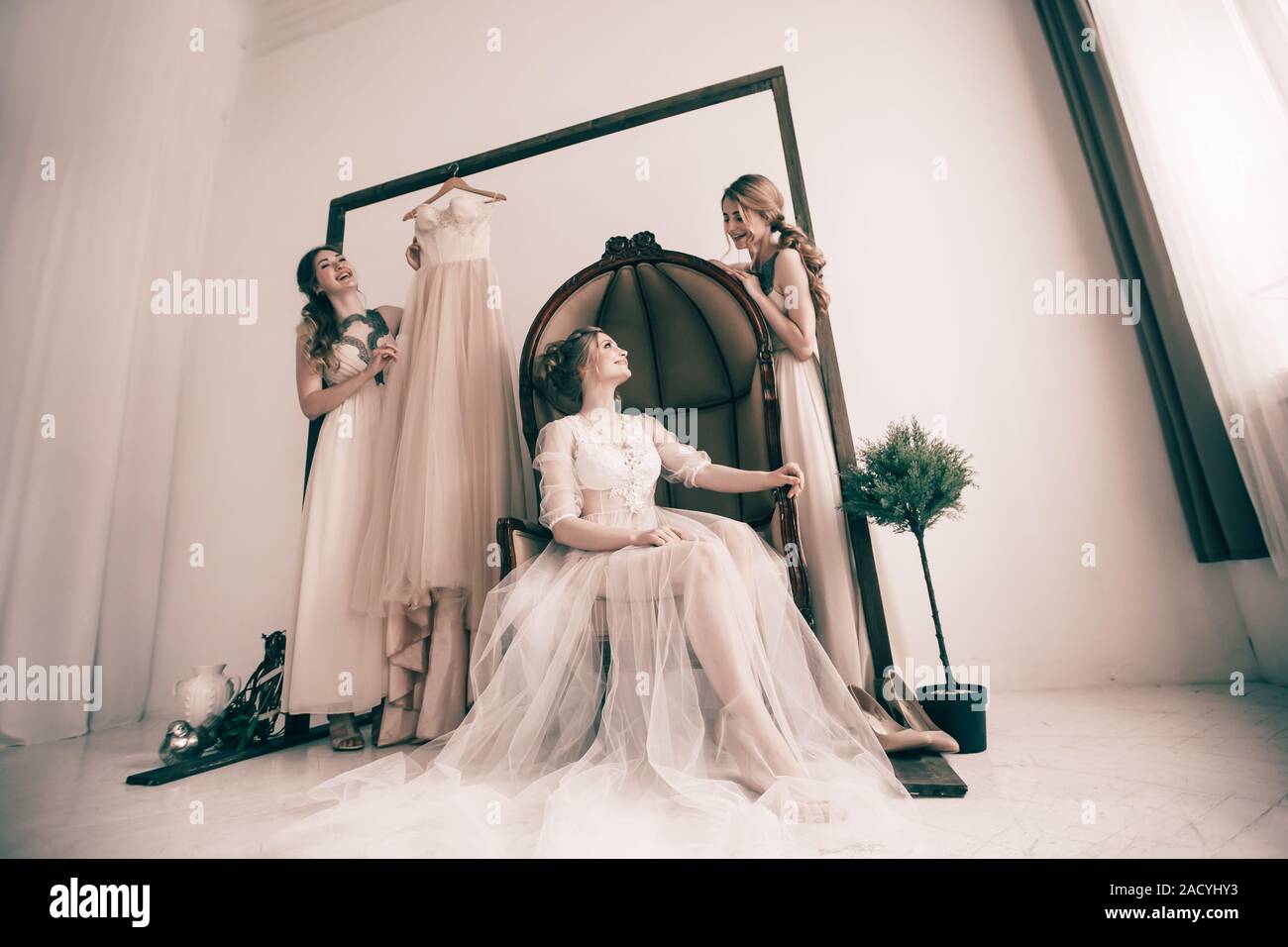 Friends wedding dress show hi-res stock photography and images - Alamy