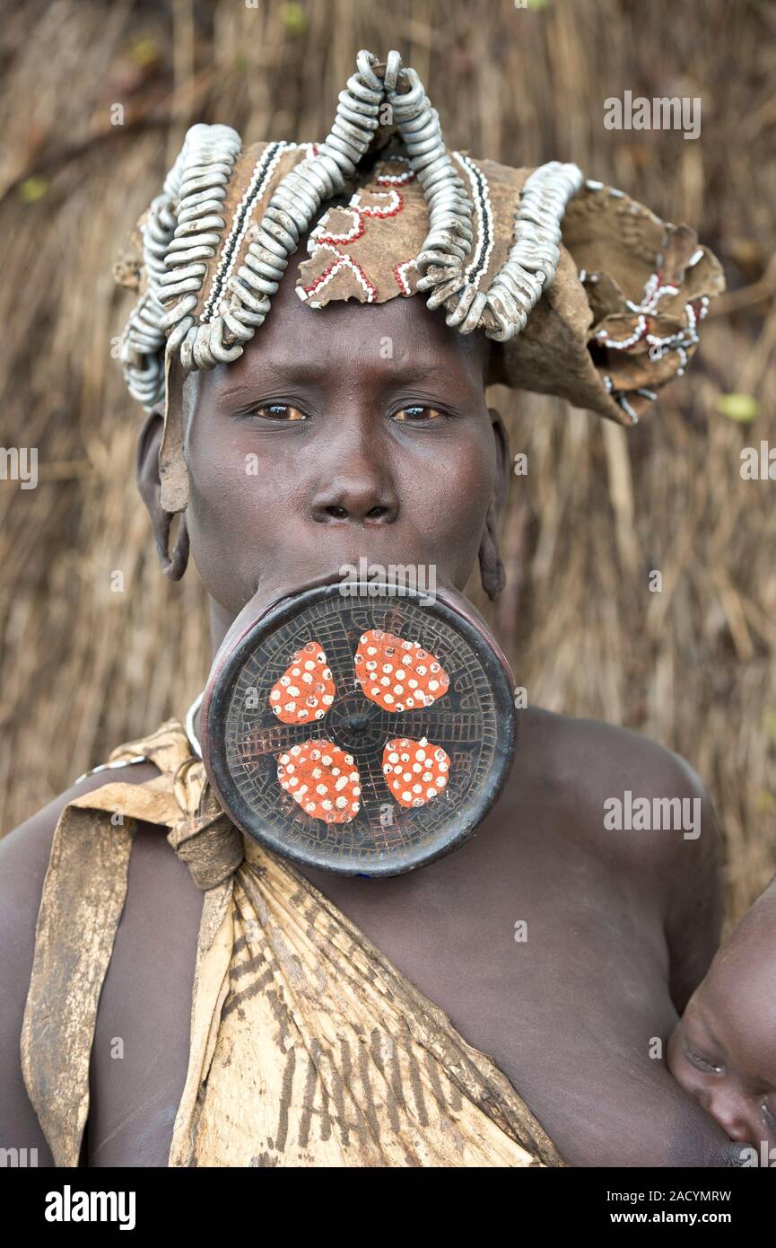 The image shows Mursi woman with a lip plate. In recent times it is